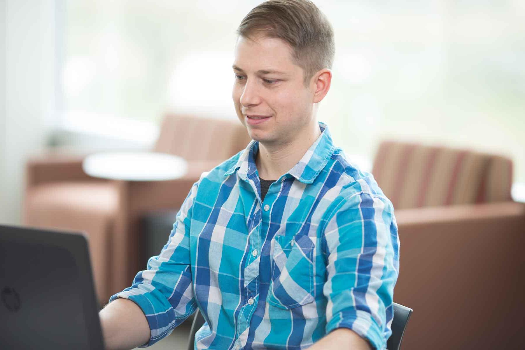 student working on laptop